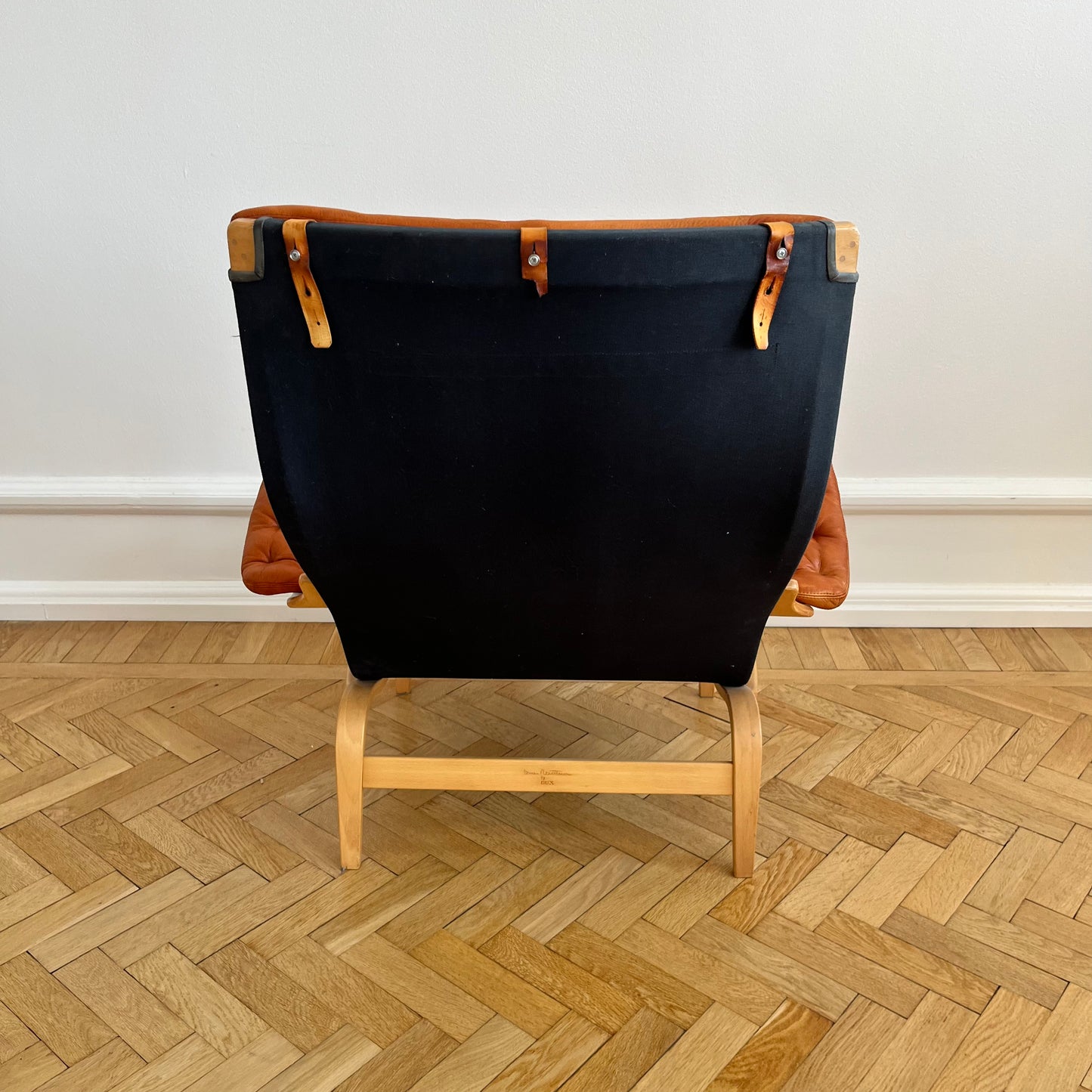 Pernilla 69 lounge chair, by Bruno Mathsson with brown leather and black canvas for DUX