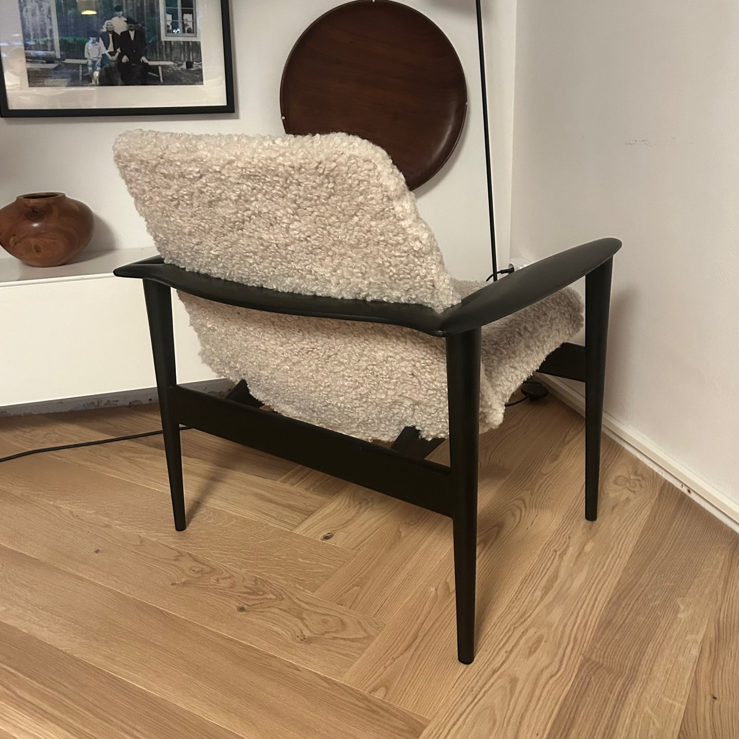 Danish 1950s lounge chair in matt black finish and teddy cover