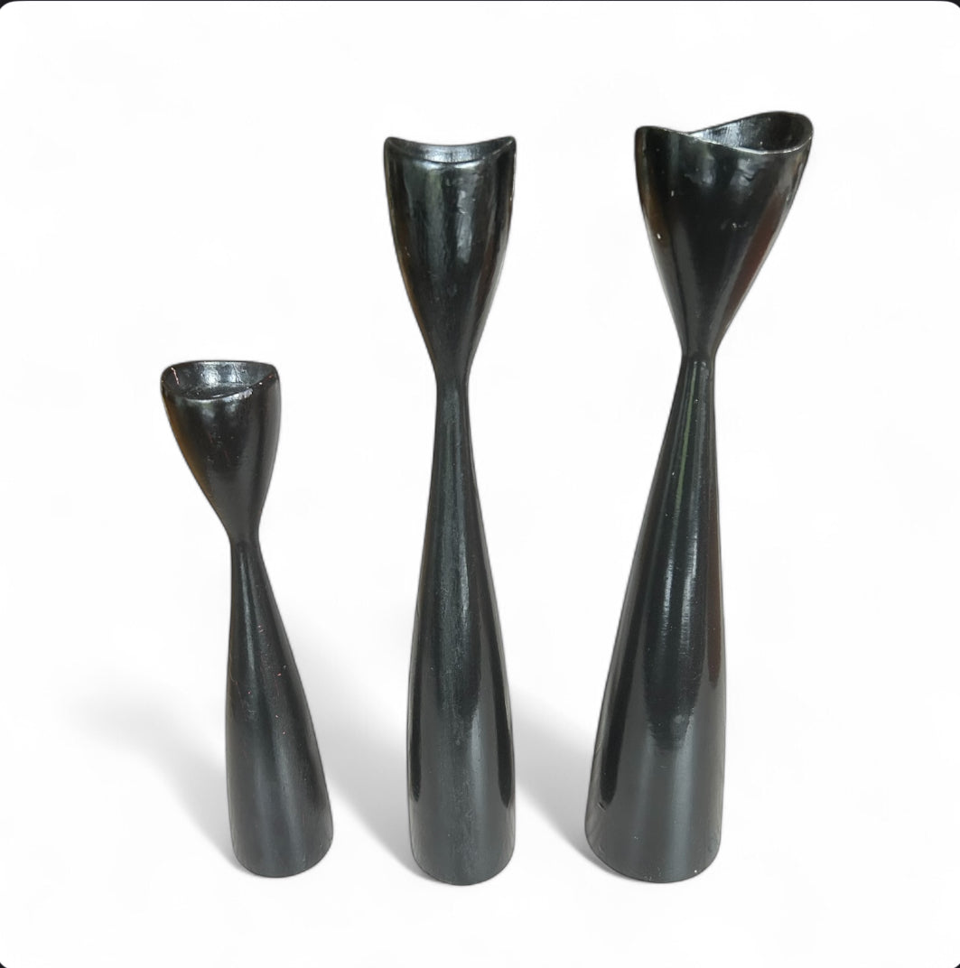 Three Danish candle holders in painted wood.