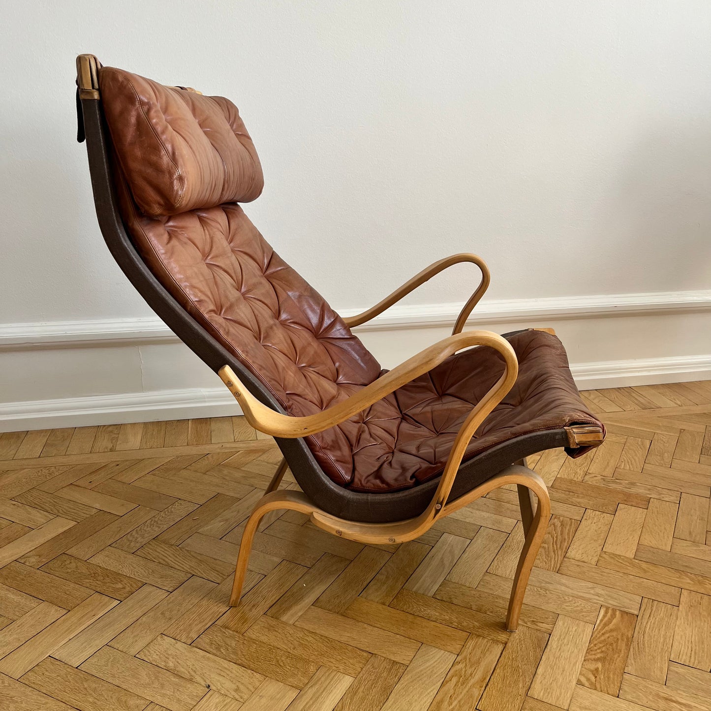 Pernilla 69 lounge chair, by Bruno Mathsson with dark brown canvas, for DUX