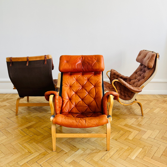 Pernilla 69 lounge chair, by Bruno Mathsson with brown leather and black canvas for DUX