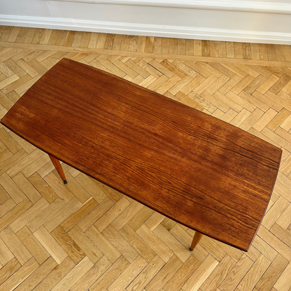 Coffee table in teak with brass magazine shelf from the 1960s