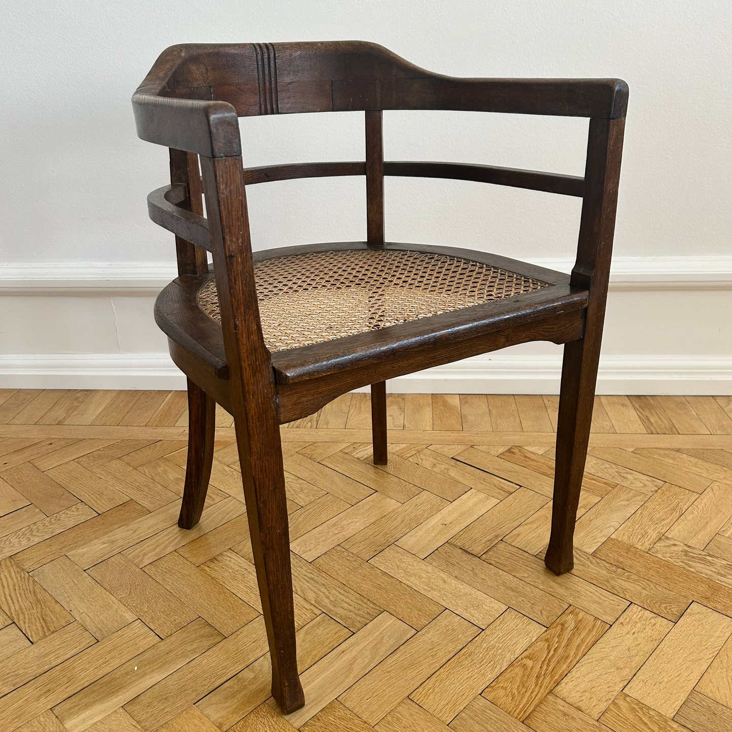 Art Noveau dining chair with woven cane seat from the early 20th century