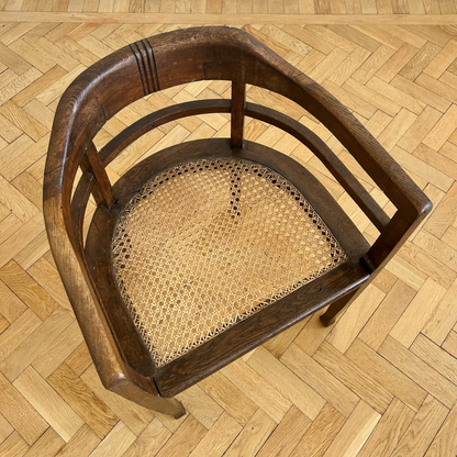 Art Noveau dining chair with woven cane seat from the early 20th century