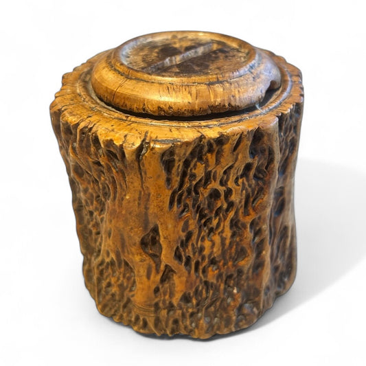 Early 1900s money box made from a tree trunk