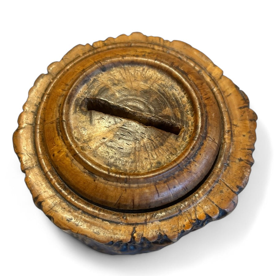 Early 1900s money box made from a tree trunk
