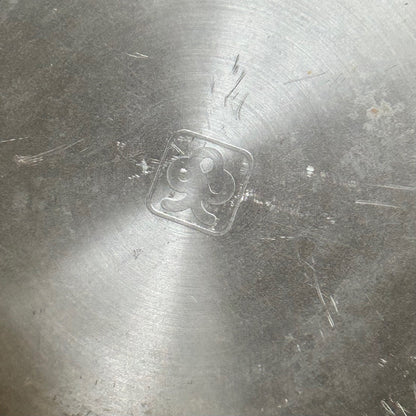 Vintage brushed steel bowl by Seita Steel with SKOP bank logo