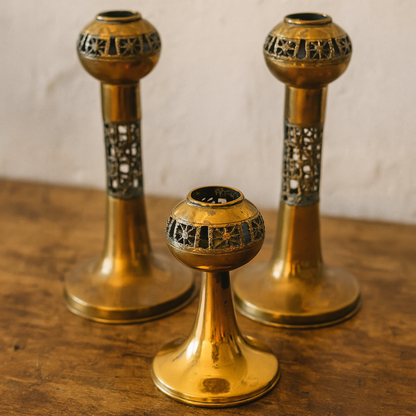 Three bronze candle holders by Pentti Sarpaneva for Turun Hopea