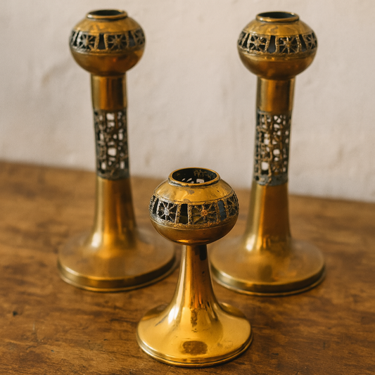 Three bronze candle holders by Pentti Sarpaneva for Turun Hopea