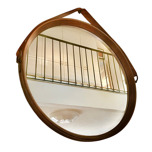 Wall mirror with leather strap by Martti Metalli