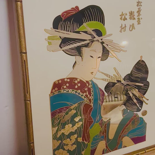 Asian mirror with faux bamboo frame from the 1980’s